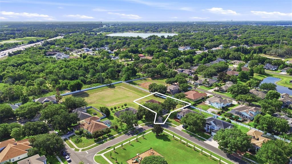 936 Kingsridge Circle Gotha, FL 34734 - Photo 37 of 50 an aerial view of residential houses with outdoor space and trees