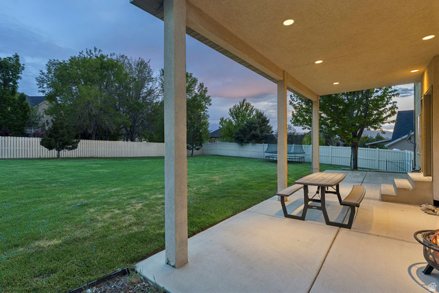 1712 Somerset Ridge Drive Draper, UT 84020 - Photo 73 of 76 Covered patio featuring recessed lighting, concrete flooring, and direct access to a spacious lawn