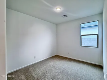 an empty room with a workbench