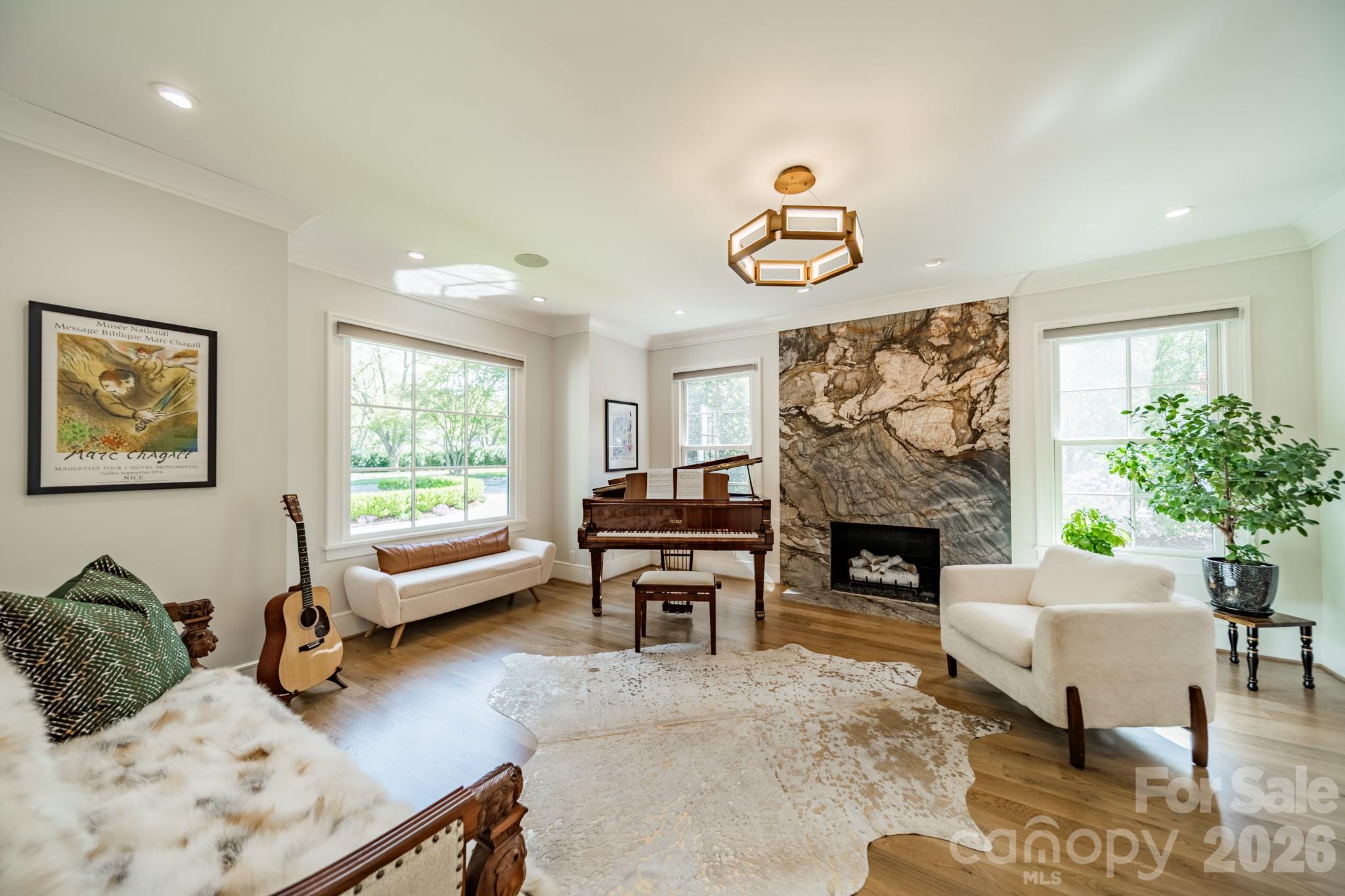 5400 Colony Road Charlotte, NC 28226 - Photo 13 of 48 a living room with furniture and a fireplace