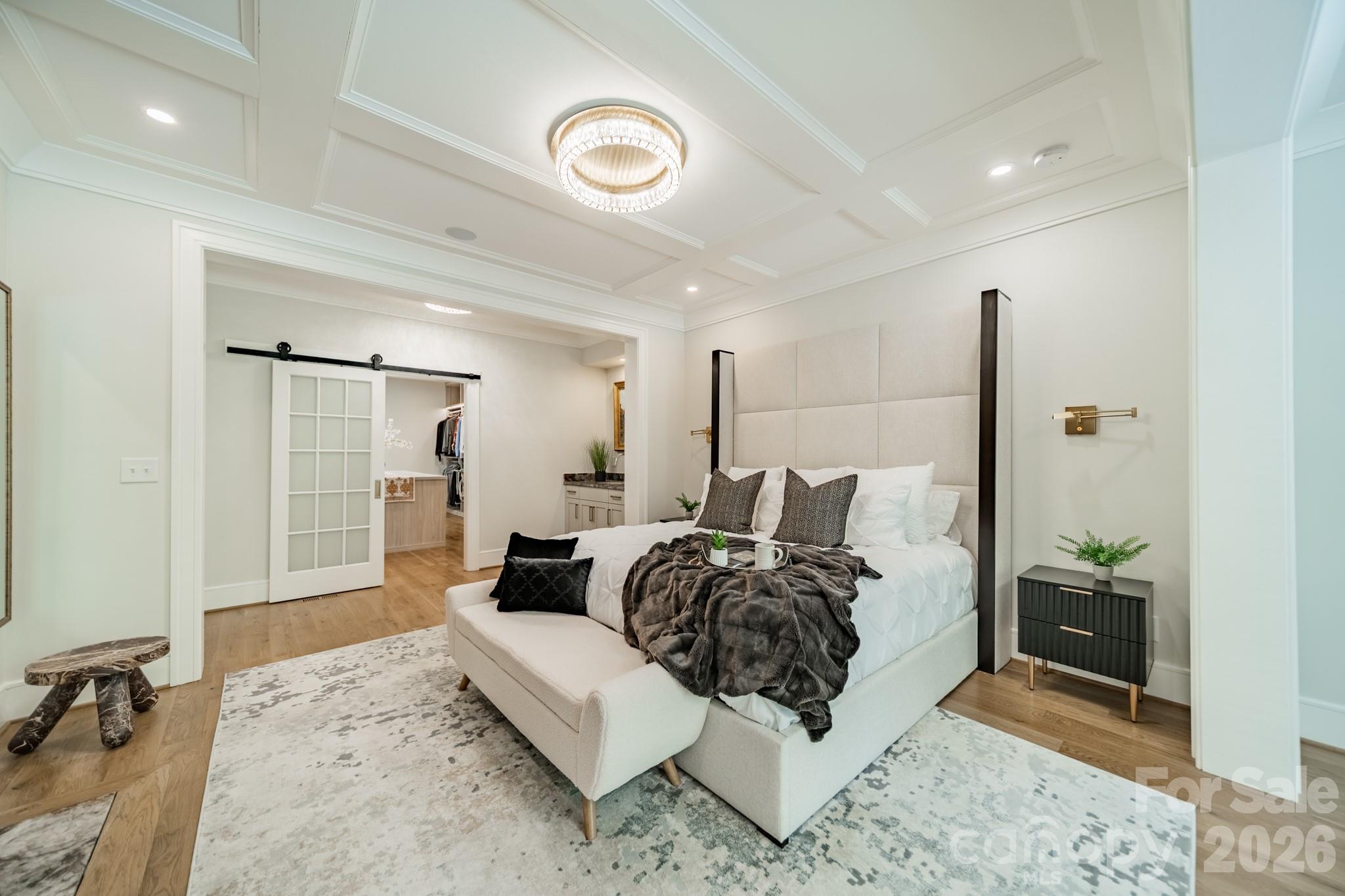 5400 Colony Road Charlotte, NC 28226 - Photo 15 of 48 a spacious bedroom with a bed a couch and dresser