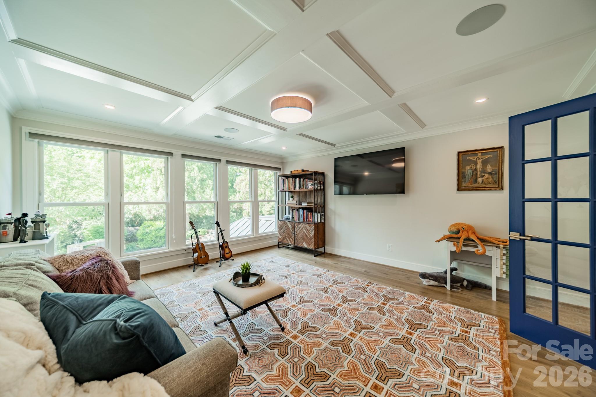 5400 Colony Road Charlotte, NC 28226 - Photo 19 of 48 a living room with furniture a rug and a flat screen tv