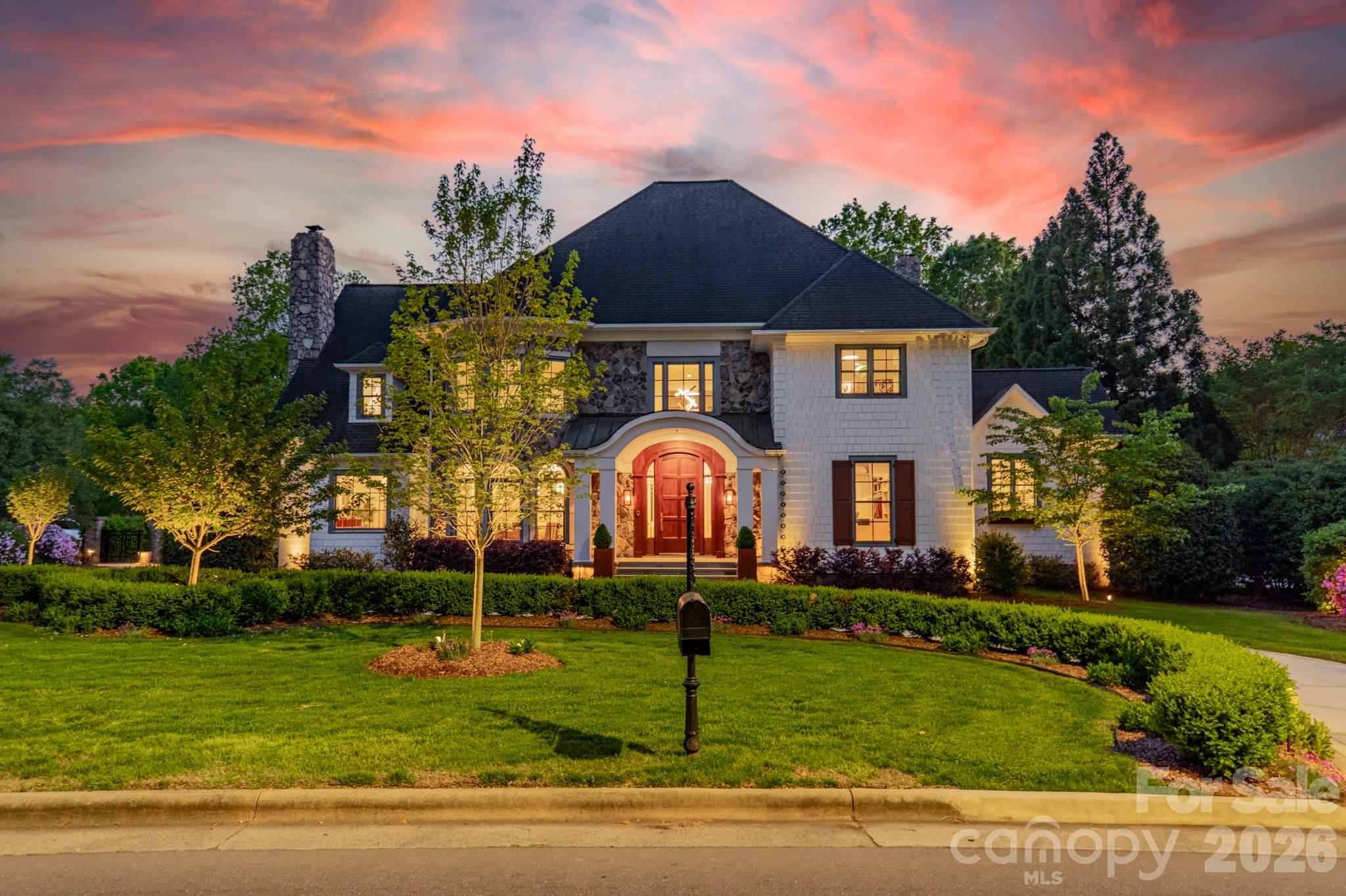 5400 Colony Road Charlotte, NC 28226 - Photo 2 of 48 a front view of house with yard and green space