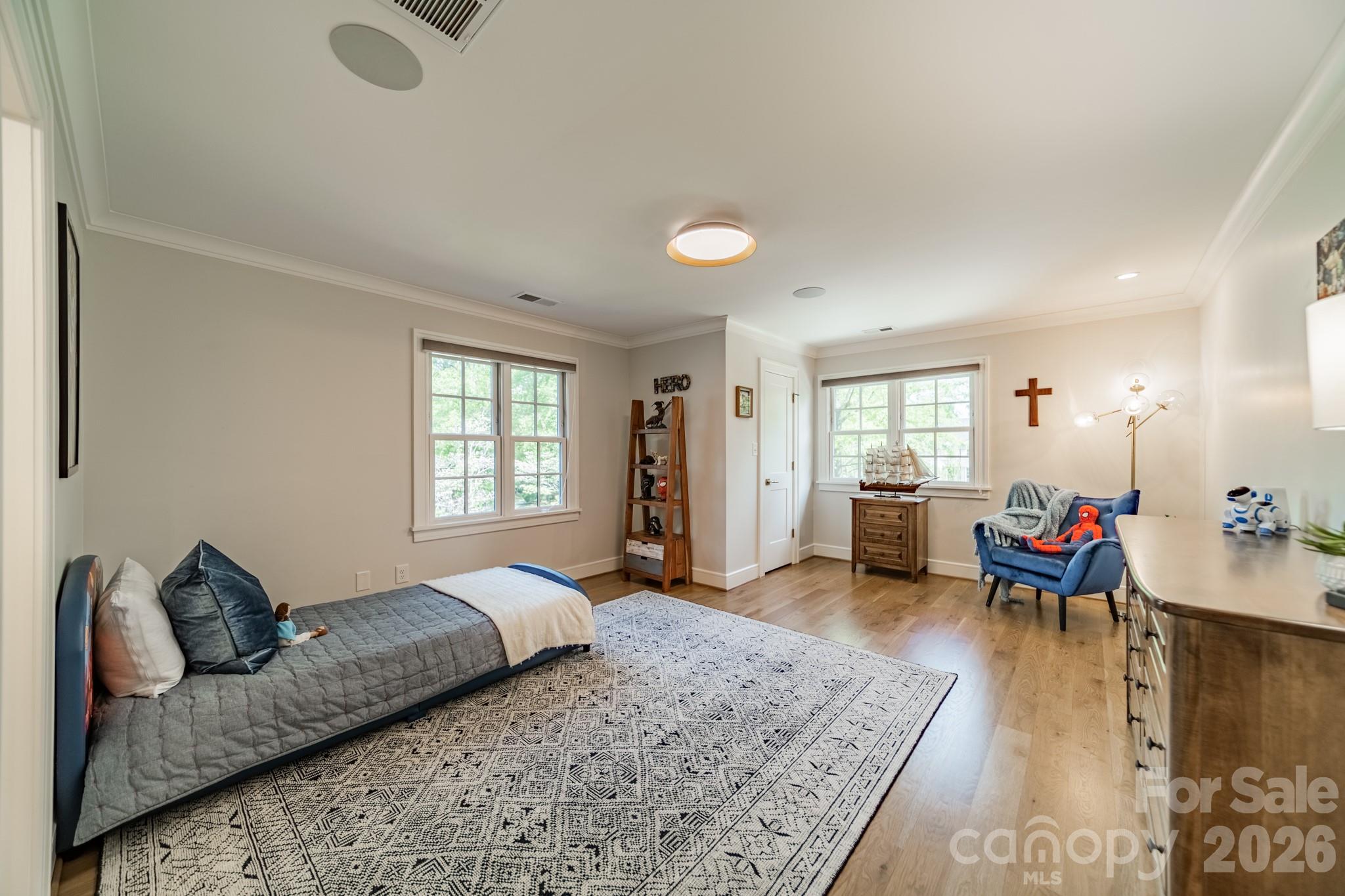 5400 Colony Road Charlotte, NC 28226 - Photo 24 of 48 a living room with furniture and wooden floor
