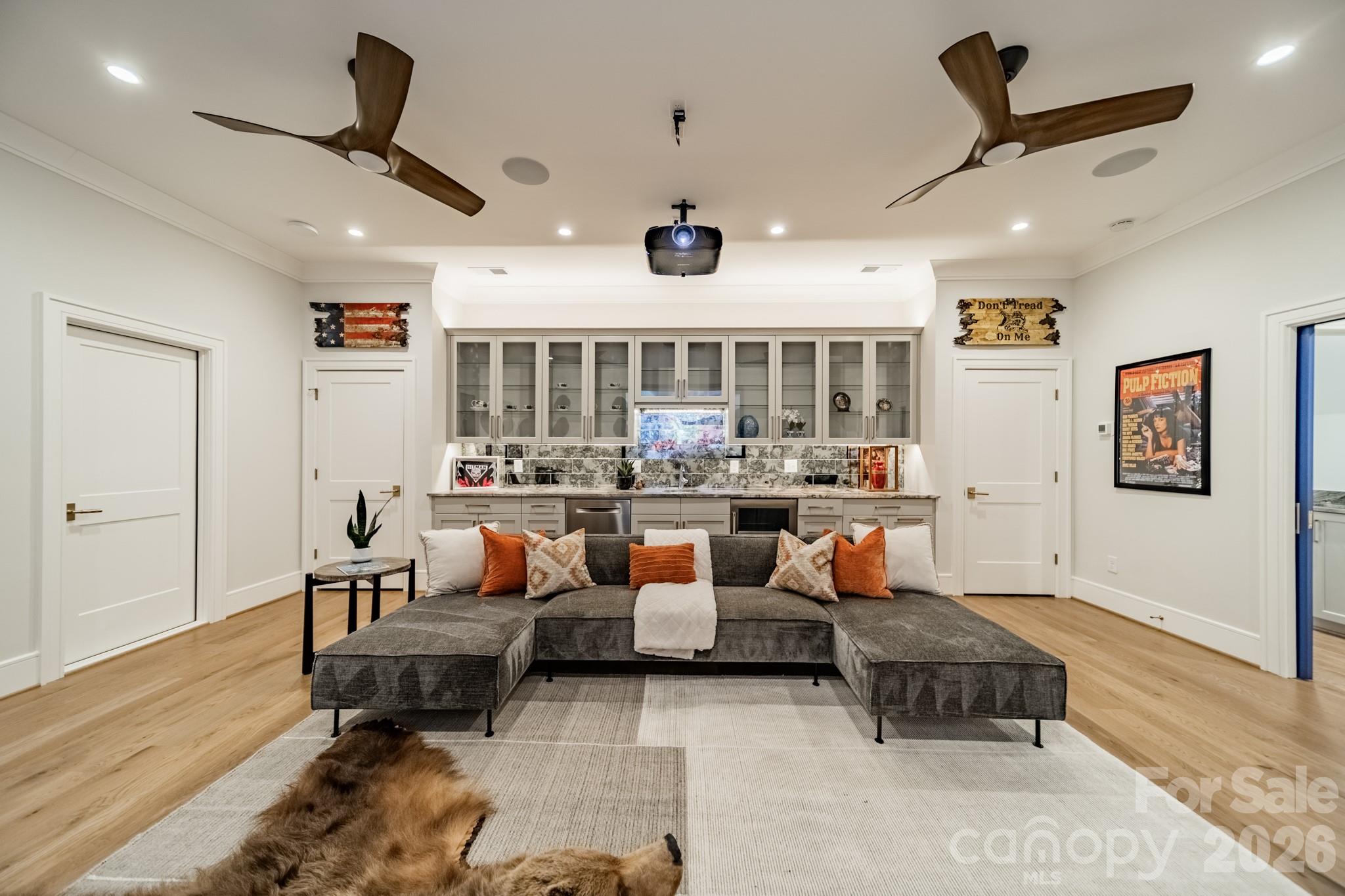 5400 Colony Road Charlotte, NC 28226 - Photo 30 of 48 a living room with furniture a window and a ceiling fan