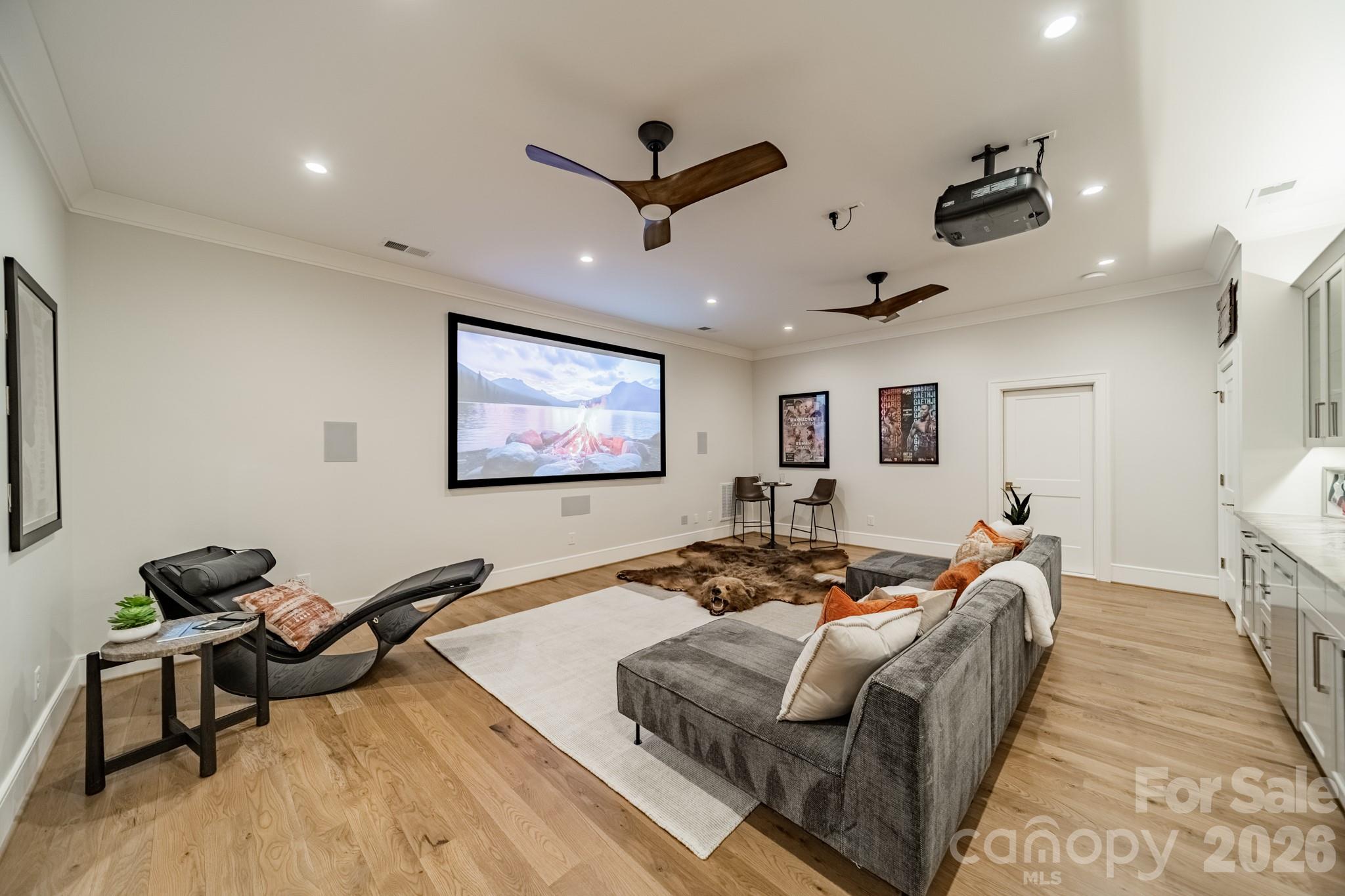 5400 Colony Road Charlotte, NC 28226 - Photo 32 of 48 a living room with furniture and a ceiling fan