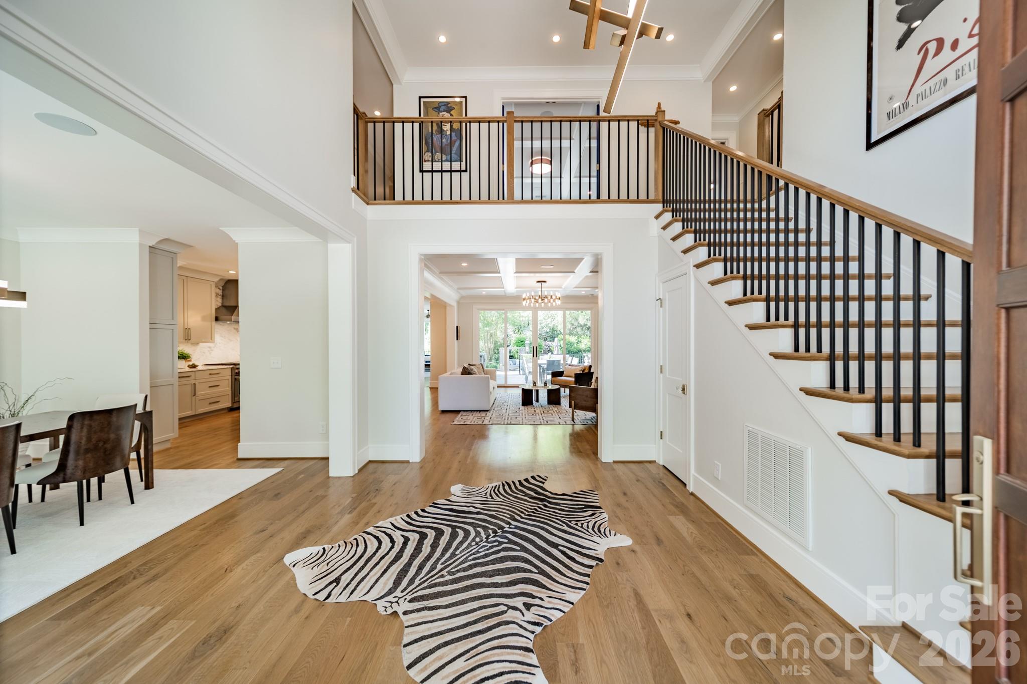 5400 Colony Road Charlotte, NC 28226 - Photo 4 of 48 a view of a livingroom with wooden floor and furniture