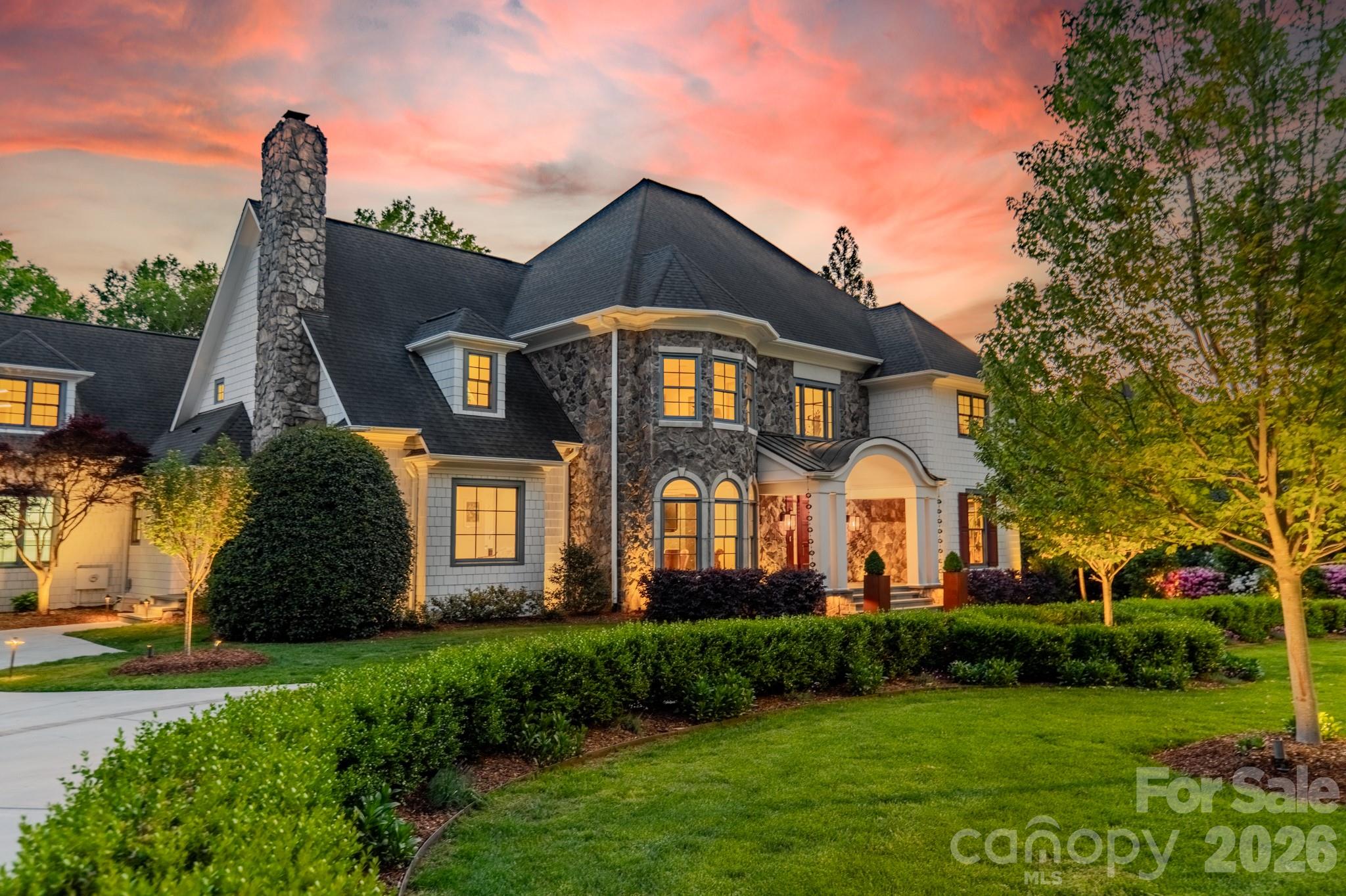 5400 Colony Road Charlotte, NC 28226 - Photo 44 of 48 a front view of a house with a yard
