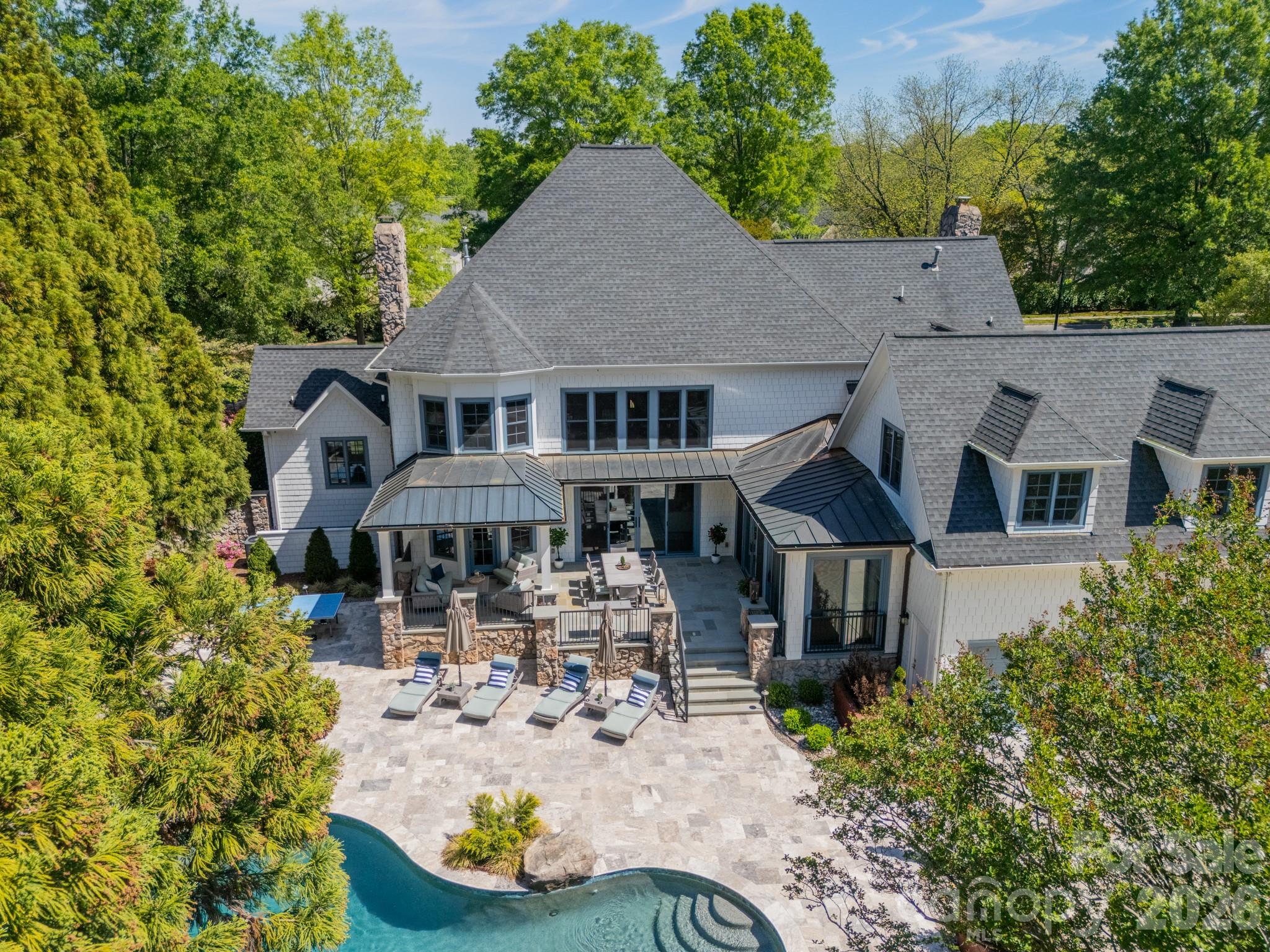 5400 Colony Road Charlotte, NC 28226 - Photo 47 of 48 an aerial view of a house with yard patio and furniture