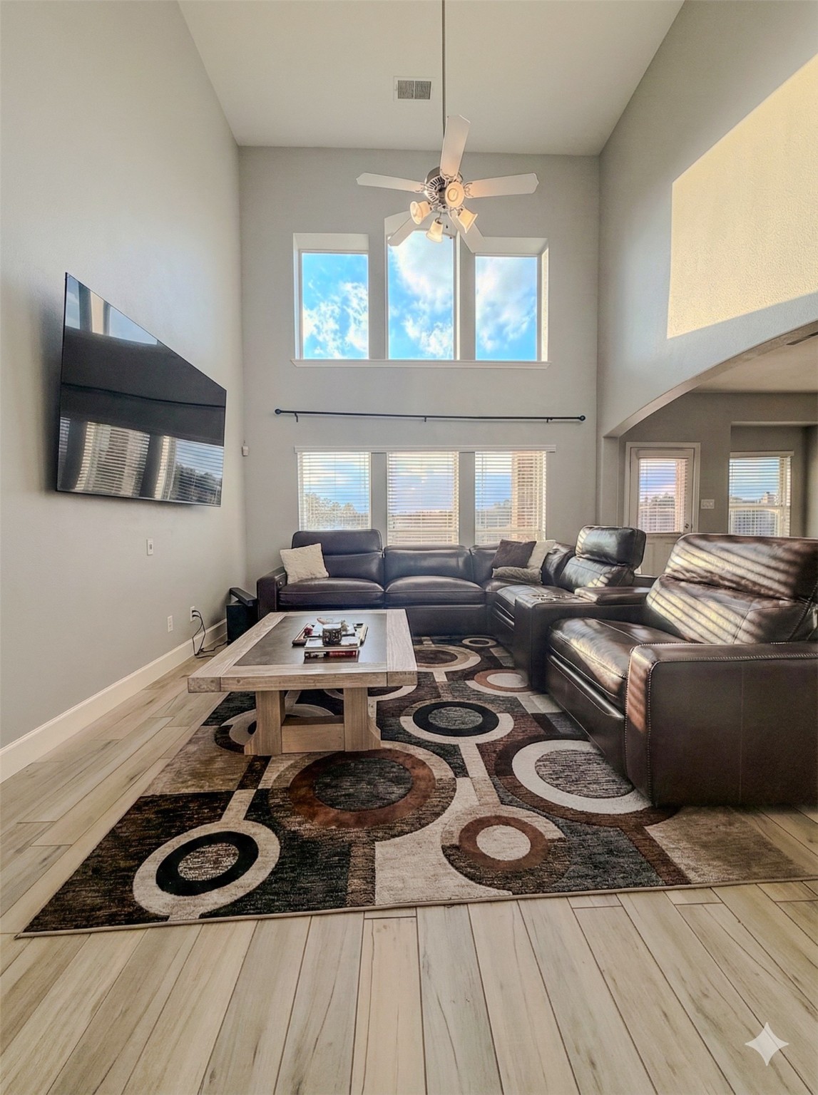 30707 Lily Trace Court Spring, TX 77386 - Photo 12 of 23 a kitchen with a stove and a wooden floor