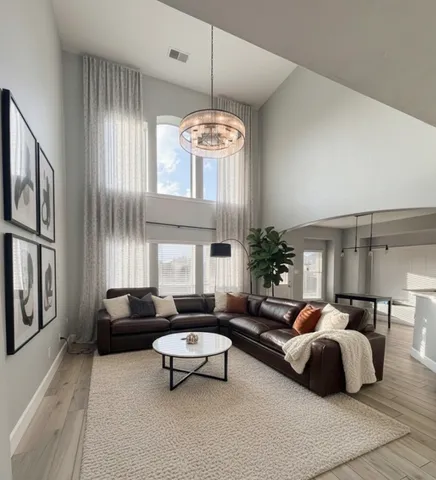 a outdoor living space with furniture and a flat screen tv