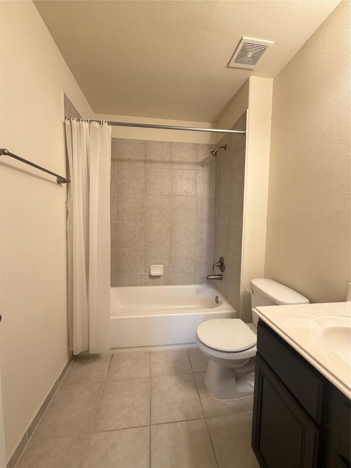 30707 Lily Trace Court Spring, TX 77386 - Photo 6 of 23 a bathroom with a granite countertop sink toilet and shower