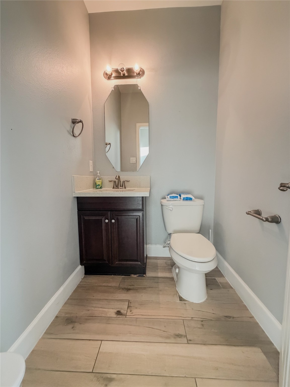 30707 Lily Trace Court Spring, TX 77386 - Photo 10 of 23 a bathroom with a toilet a sink and mirror
