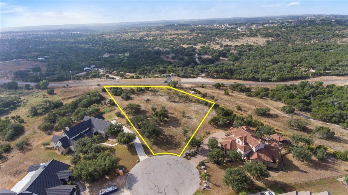 8816 Bellancia Drive Austin, TX 78738 - Photo 1 of 1 an aerial view of residential houses with outdoor space