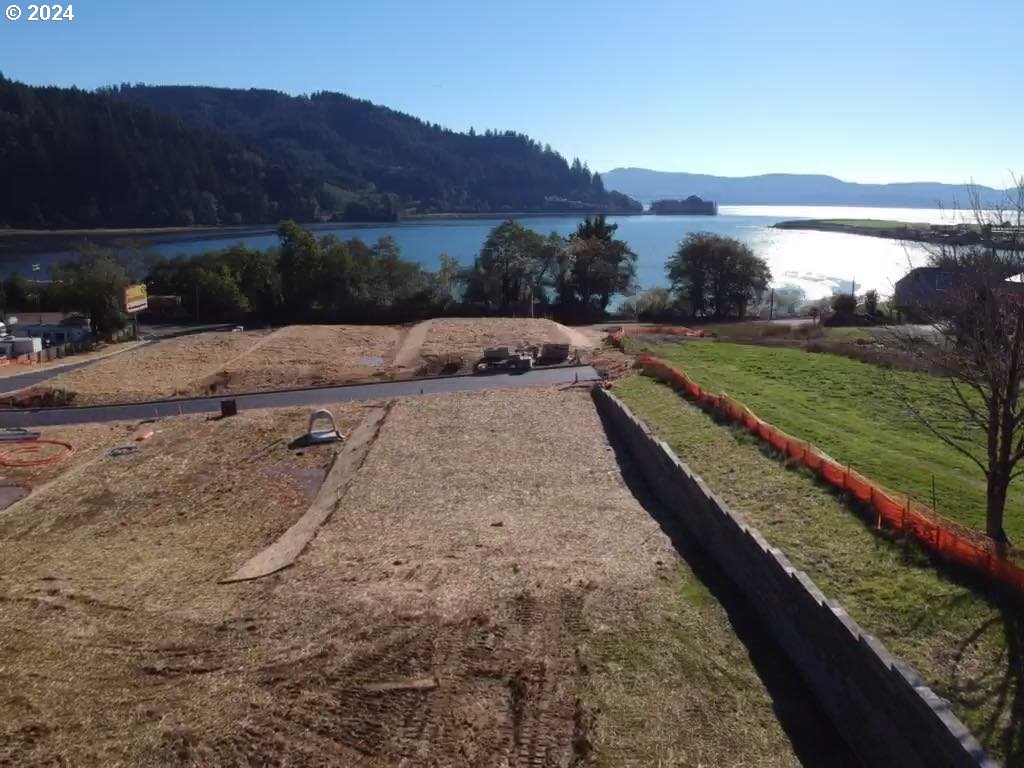 501 Garibaldi Avenue, Unit 3 Garibaldi, OR 97118 - Photo 14 of 27 a view of a backyard with a garden