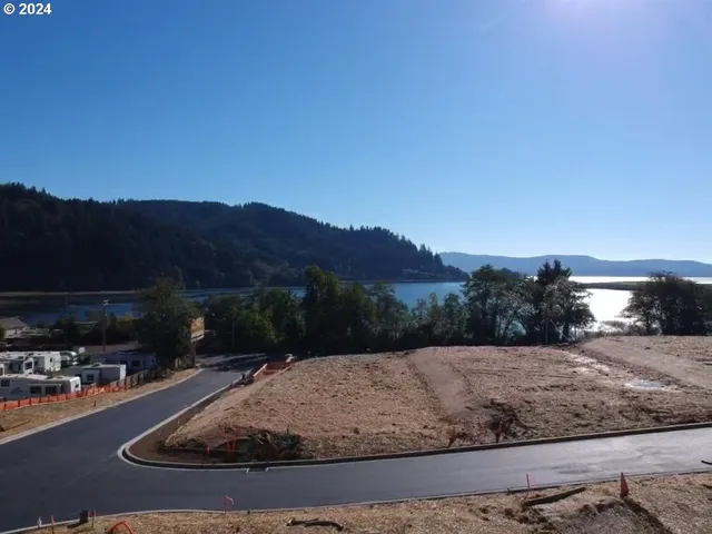 a view of a backyard of a house