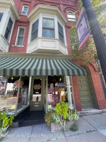a view of a chairs and tables in the patio