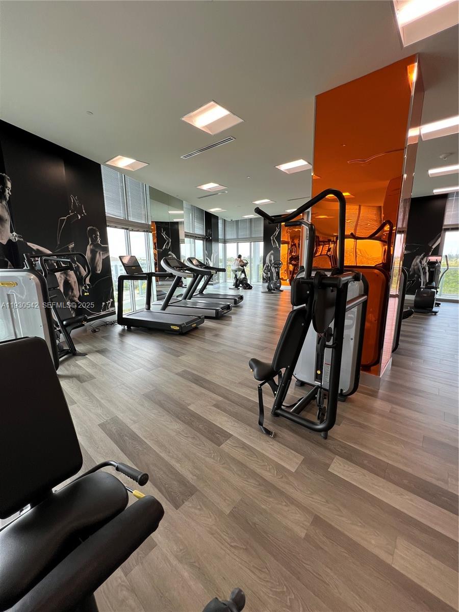2000 Metropica Way, Unit 2108 Sunrise, FL 33323 - Photo 34 of 44 a view of a room with gym equipment