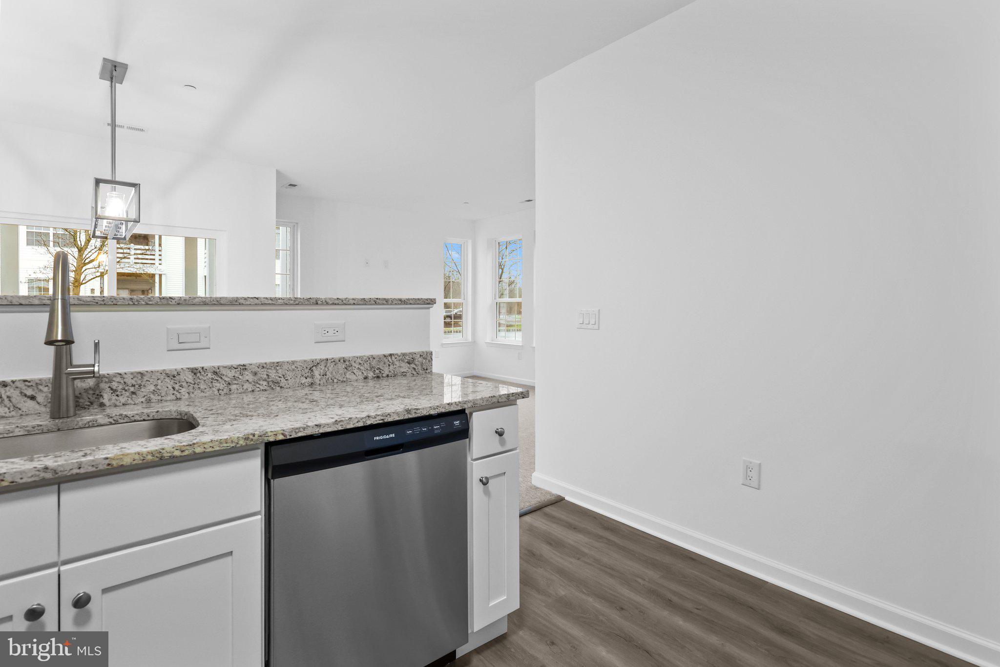 11112 Cornerstone Drive Yardley, PA 19067 - Photo 11 of 25 a kitchen with a sink and a mirror