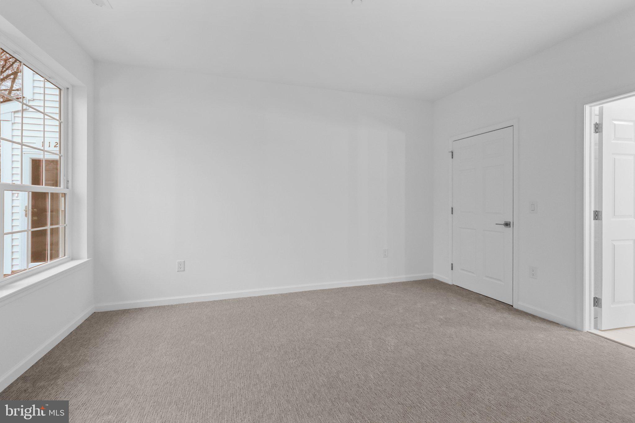 11112 Cornerstone Drive Yardley, PA 19067 - Photo 18 of 25 an empty room with a window