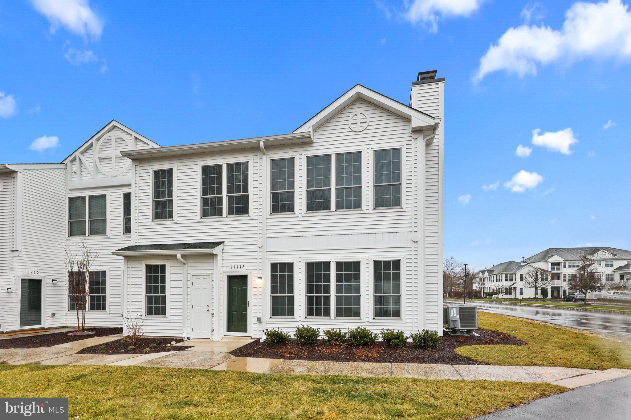 11112 Cornerstone Drive Yardley, PA 19067 - Photo 2 of 25 a front view of a house with swimming pool and porch