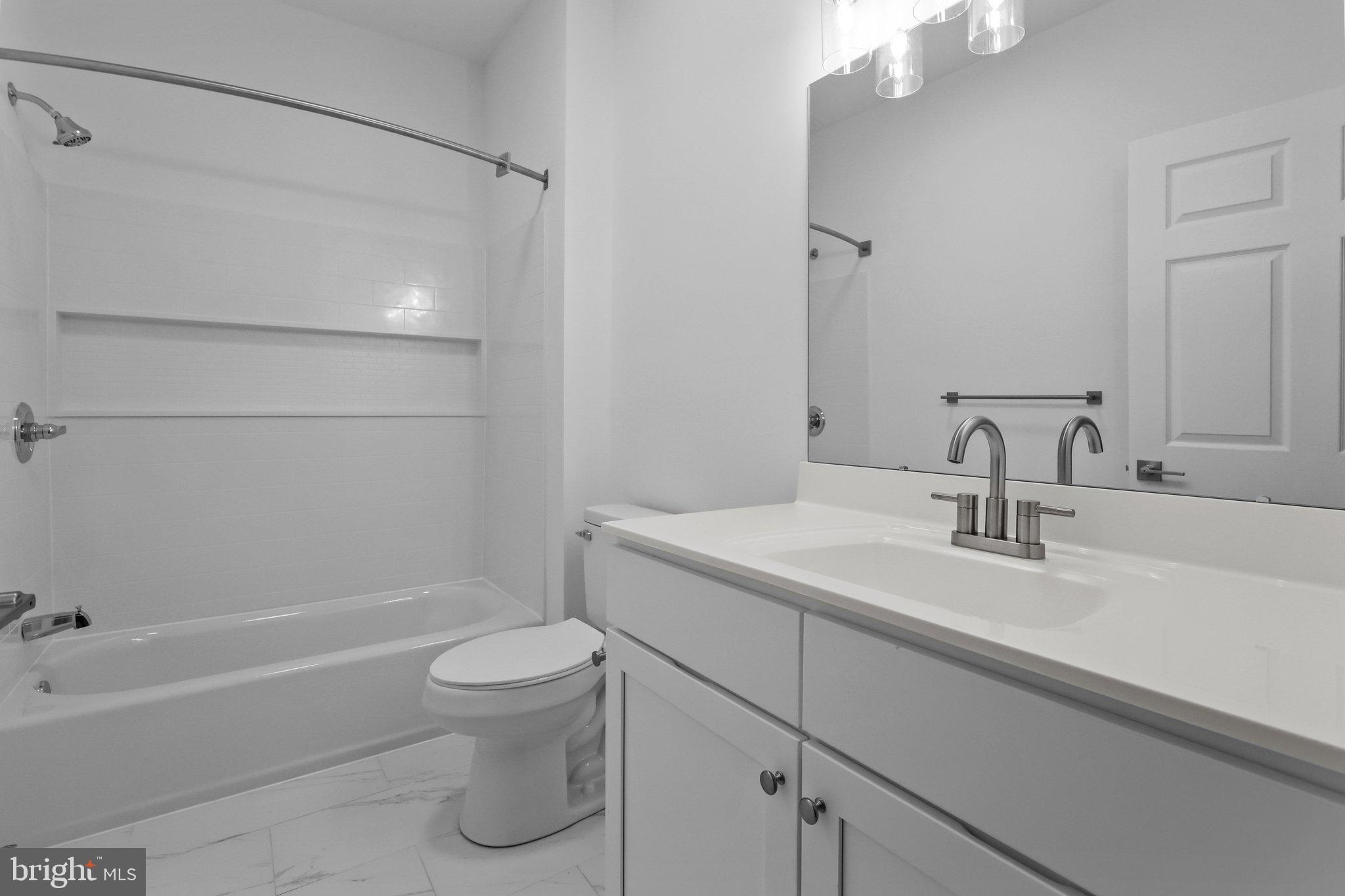 11112 Cornerstone Drive Yardley, PA 19067 - Photo 22 of 25 a bathroom with a sink a toilet and shower