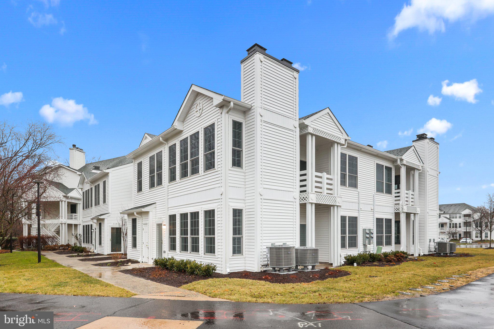 11112 Cornerstone Drive Yardley, PA 19067 - Photo 24 of 25 a front view of a building with street view