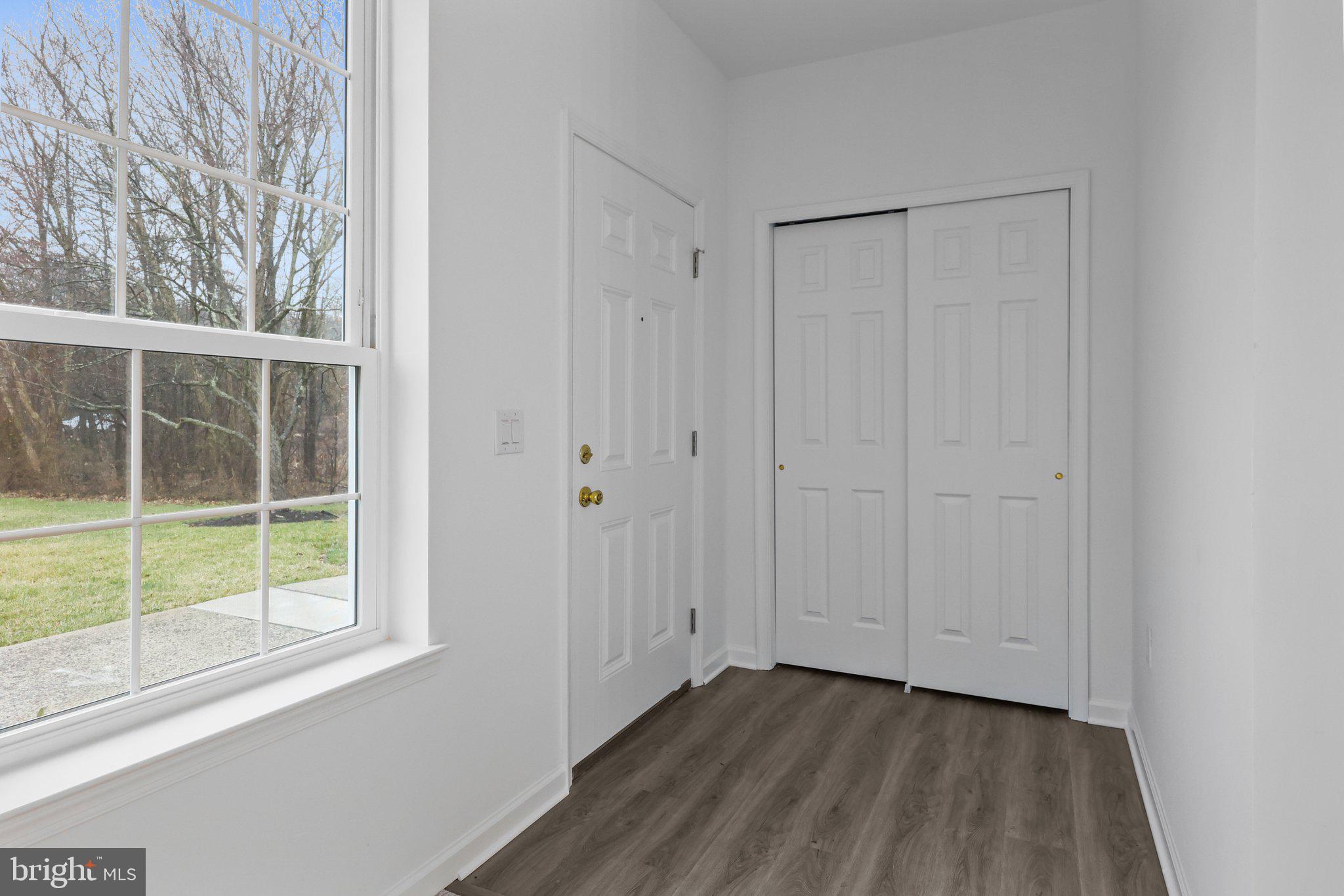 11112 Cornerstone Drive Yardley, PA 19067 - Photo 4 of 25 a view of small space with wooden floor and windows