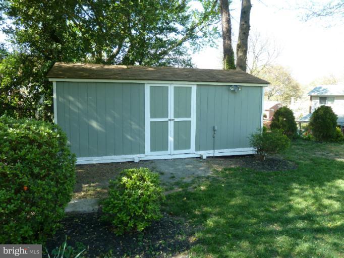 12908 Bluhill Road Silver Spring, MD 20906 - Photo 11 of 26 a front view of a house with garden