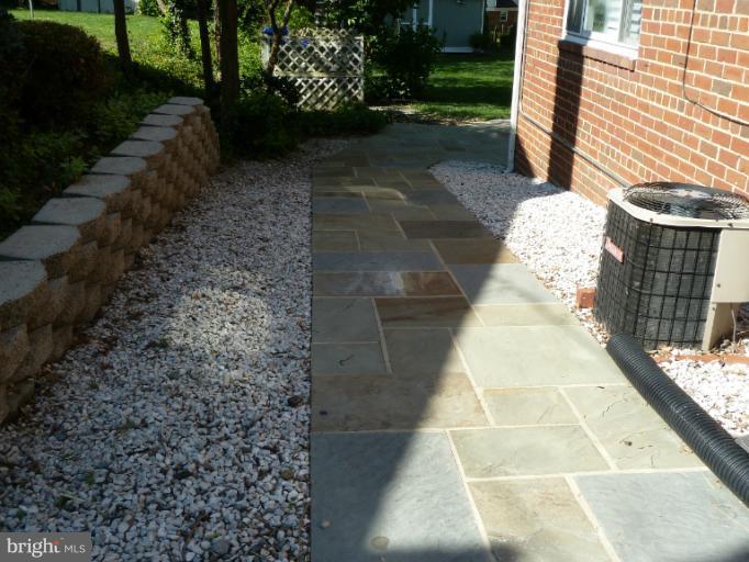 12908 Bluhill Road Silver Spring, MD 20906 - Photo 16 of 26 a view of a pathway with a yard