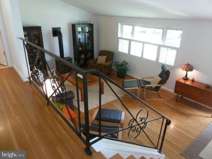12908 Bluhill Road Silver Spring, MD 20906 - Photo 20 of 26 a view of a livingroom with furniture and a window
