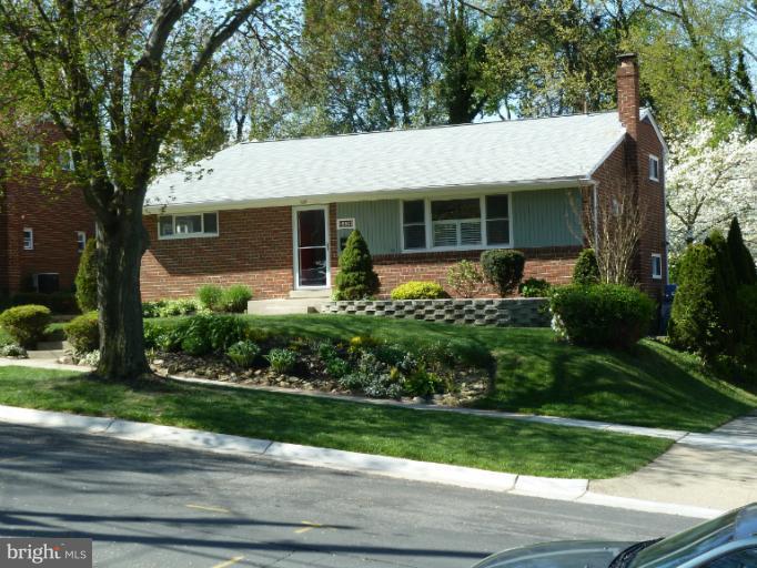 12908 Bluhill Road Silver Spring, MD 20906 - Photo 26 of 26 front view of a house with a yard
