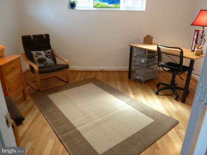 12908 Bluhill Road Silver Spring, MD 20906 - Photo 7 of 26 a view of a workspace with furniture