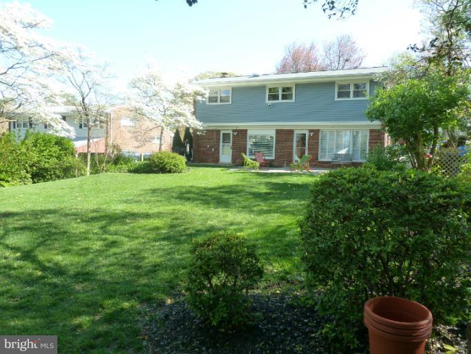 12908 Bluhill Road Silver Spring, MD 20906 - Photo 10 of 26 a front view of a house with a yard