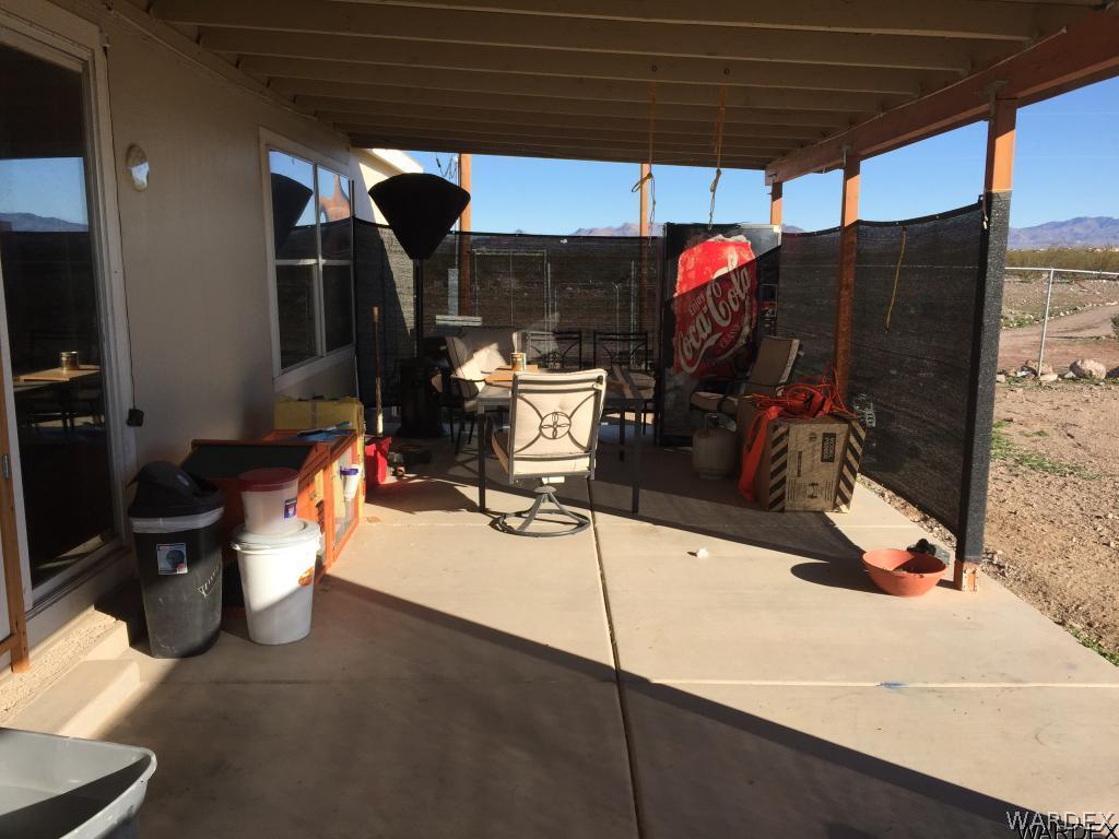 3995 Eloy Road, Unit 66 Golden Valley, AZ 86413 - Photo 24 of 27 a view of entryway and patio