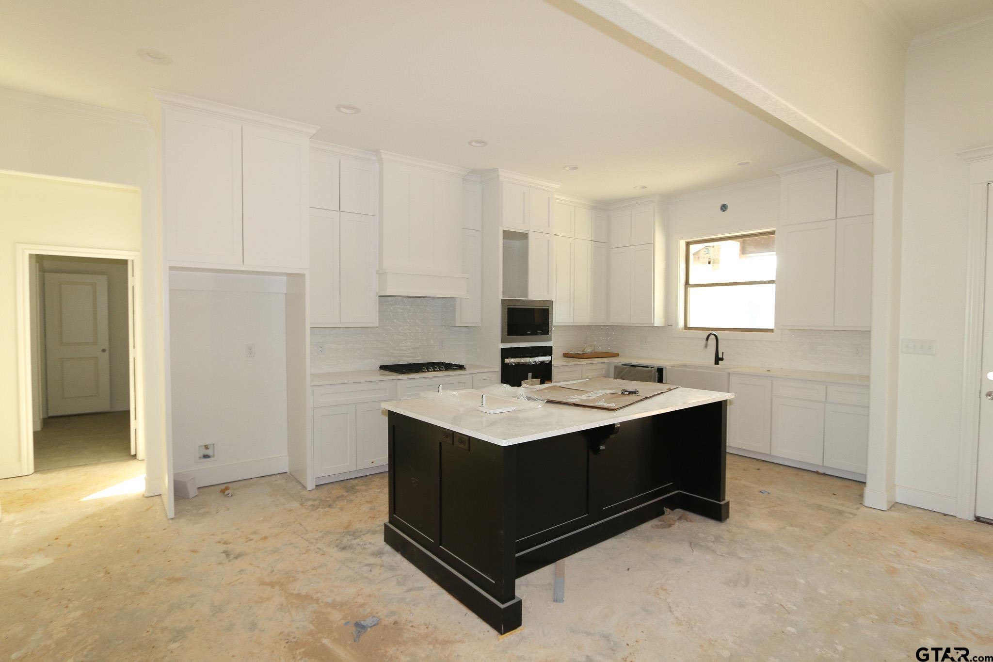 16503 Cooper Way Flint, TX 75762 - Photo 14 of 33 a view of kitchen with stainless steel appliances granite countertop a sink stove and refrigerator