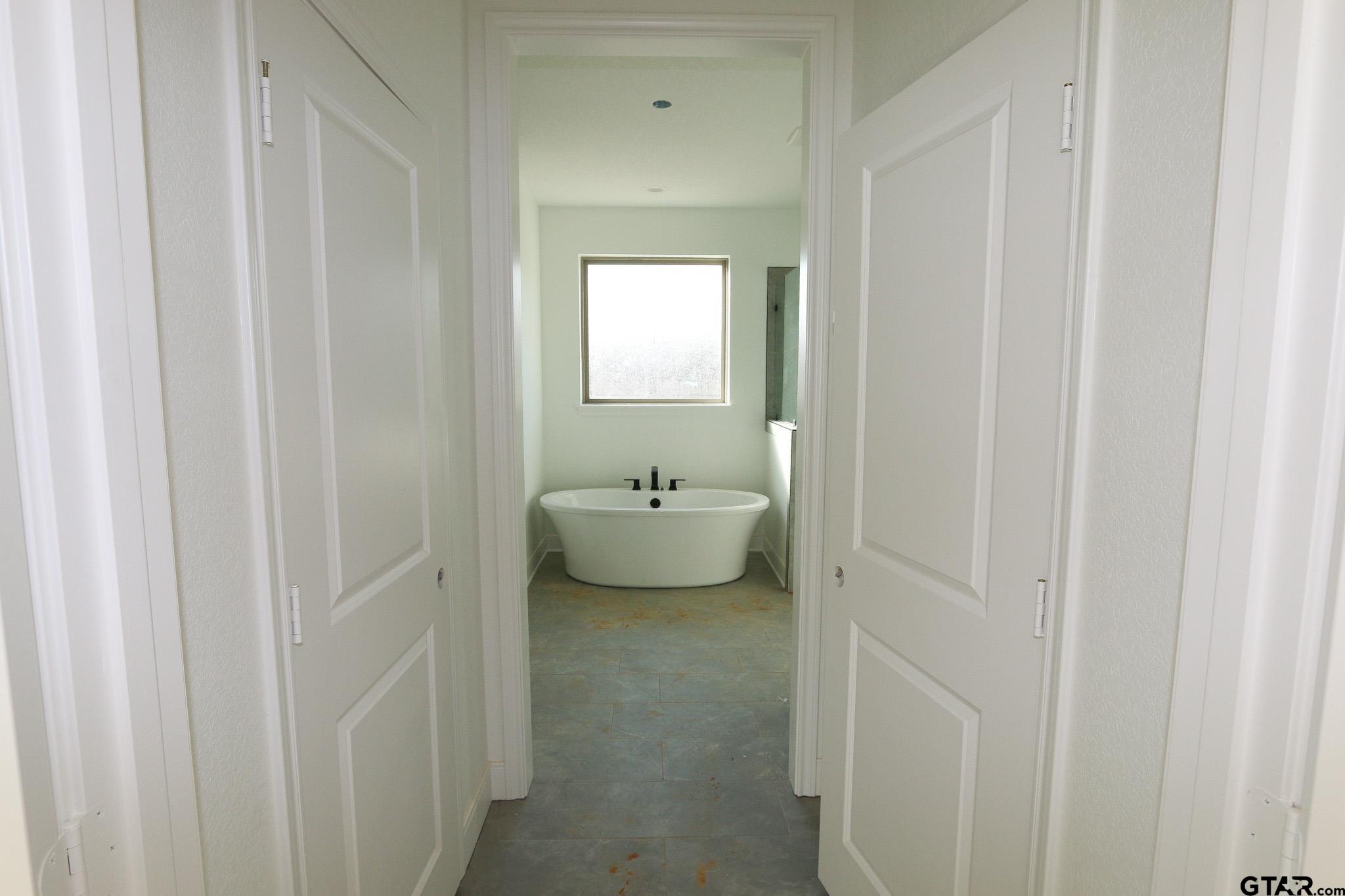 16503 Cooper Way Flint, TX 75762 - Photo 19 of 33 a bathroom with a sink and mirror