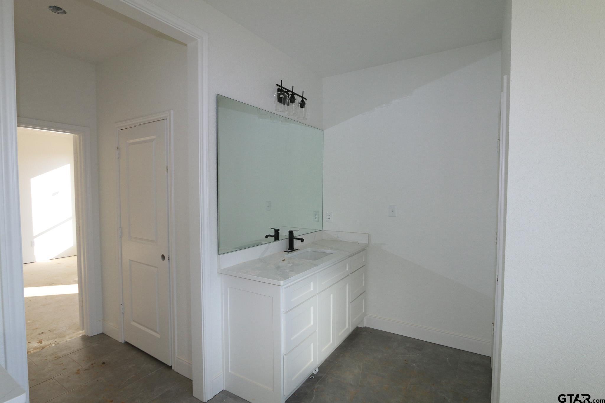 16503 Cooper Way Flint, TX 75762 - Photo 22 of 33 a bathroom with a sink