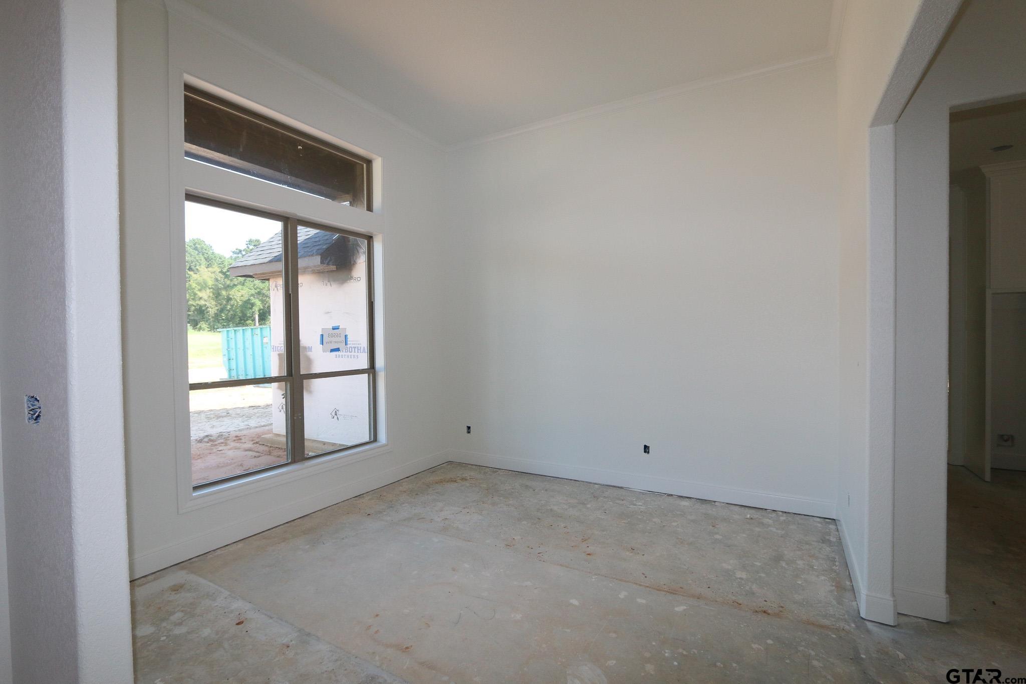 16503 Cooper Way Flint, TX 75762 - Photo 9 of 33 a view of an empty room with a window