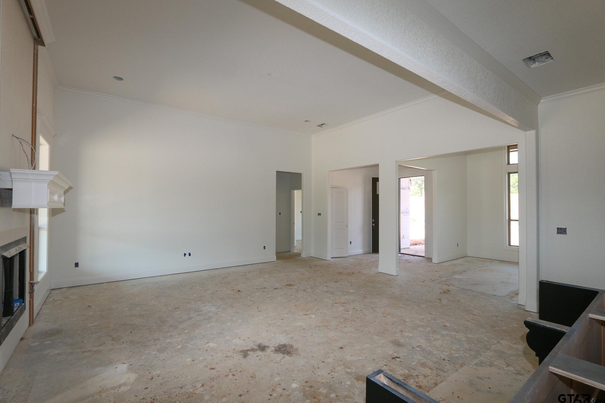 16503 Cooper Way Flint, TX 75762 - Photo 10 of 33 a view of an empty room with a fireplace