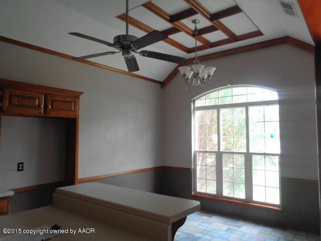 4210 Rincon Avenue Amarillo, TX 79110 - Photo 3 of 11 a view of an empty room with a window