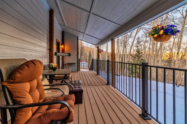 a view of balcony with furniture