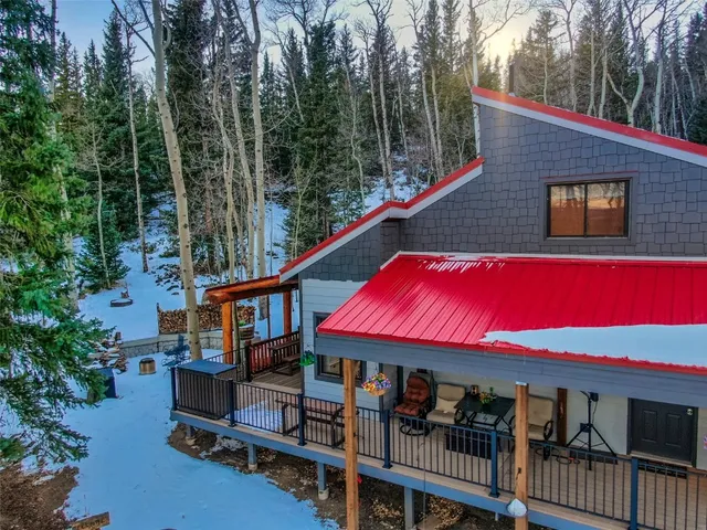 a view of a town with mountains in the background