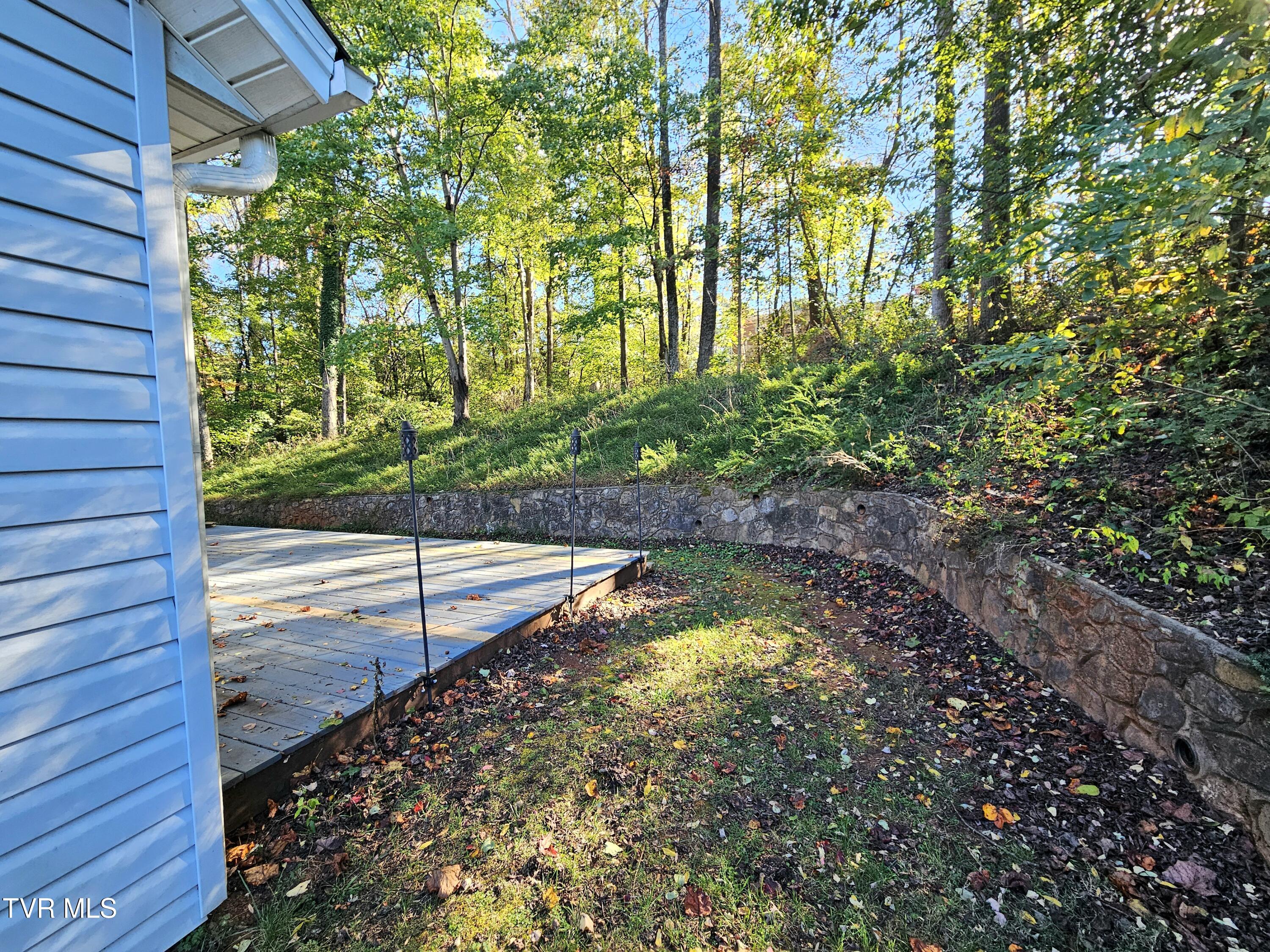 149 Sherwood Circle Ridgeway, VA 24148 - Photo 31 of 39 sideyard retaining wall