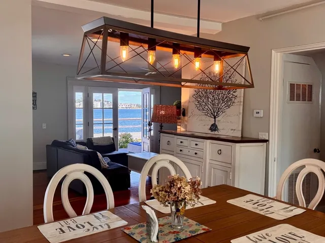 a view of a hallway with washer and dryer