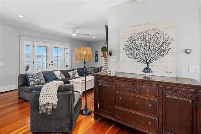 a living room with couches and furniture