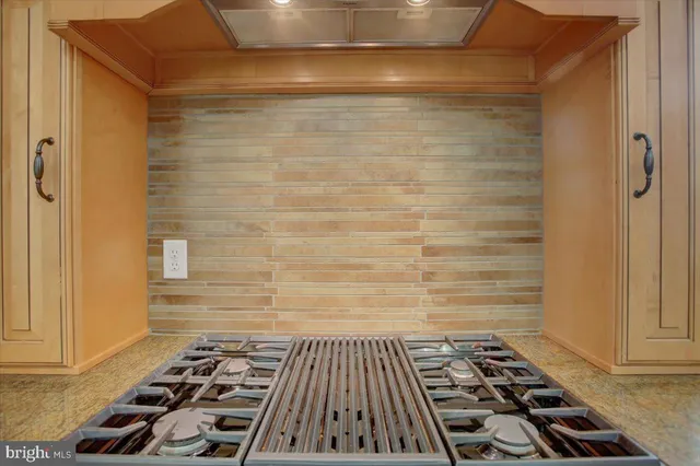 a bathroom sink sitting next to a window