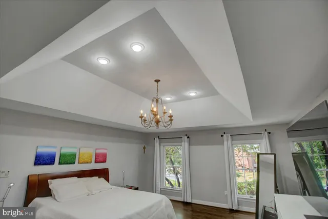 a en suite bathroom with a double vanity sink a mirror and a shower