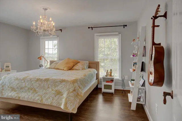 a workspace with furniture and a potted plant