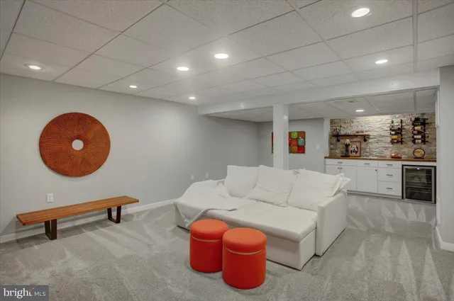 a view of a backyard with a large tree